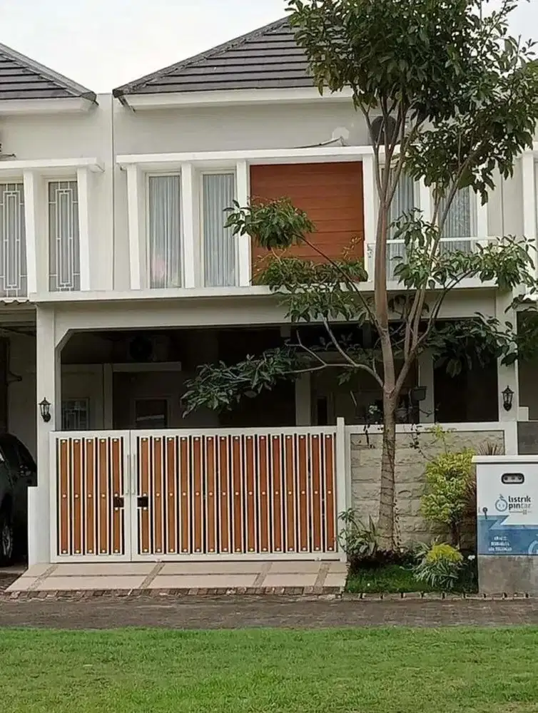 Rumah siap huni 2 lantai depan fasum jalan boulevard puri surya jaya