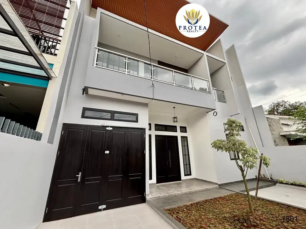 Rumah Minimalis Modern dengan Kolam Renang di di Jalan Utama