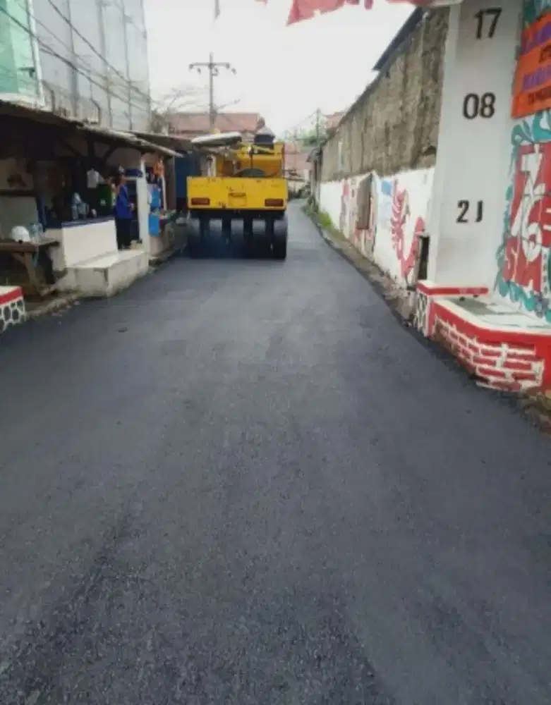 Aspal hotmix halaman ruko