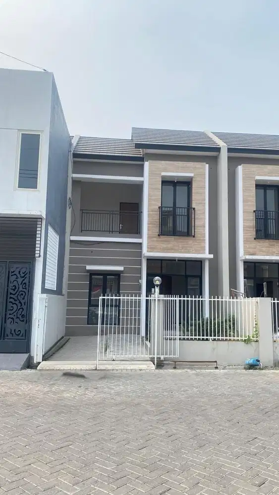 Disewakan rumah baru Gress boulevard utama Alana Tambak Oso