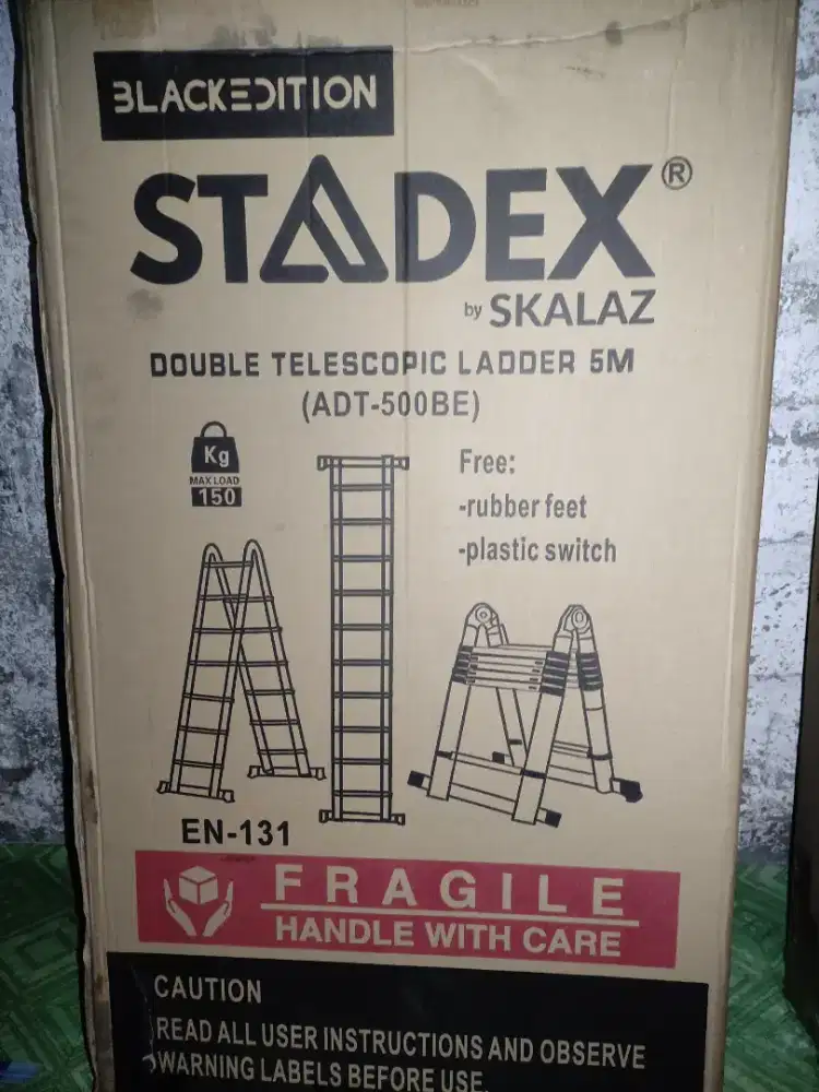 Tangga lipat teleskopik dobel