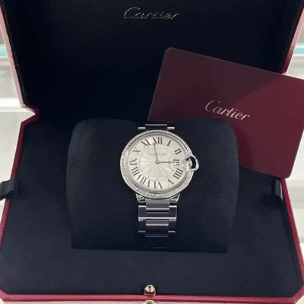Cartier Ballon Bleu Diamond Bezel not rolex