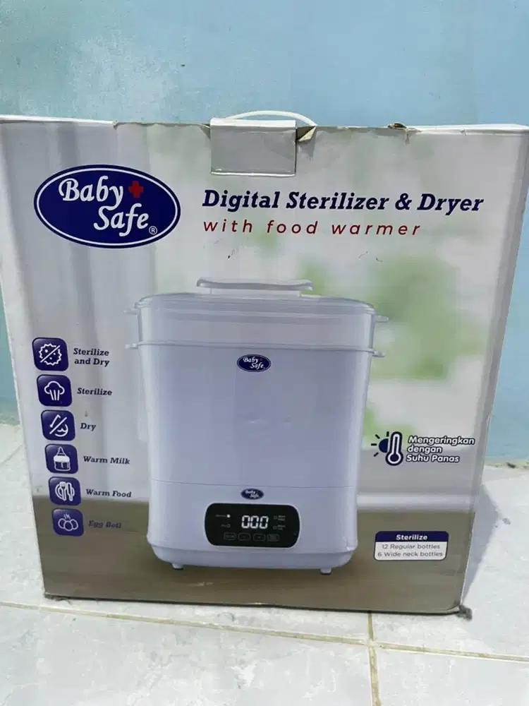 Penghangat Asi dan stirilizer