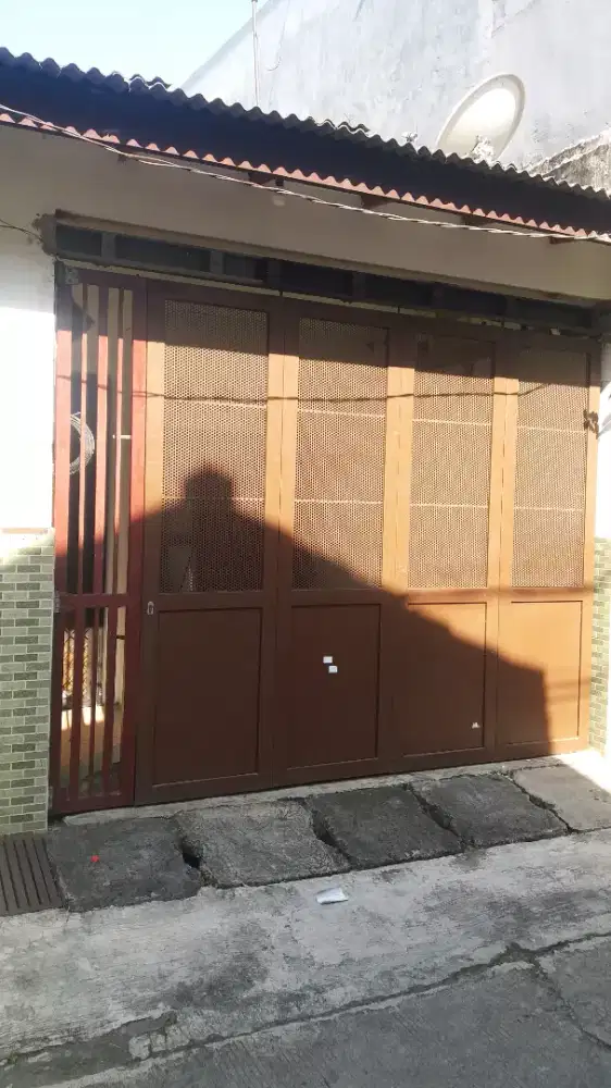 Pintu Garasi Dorong Tikung