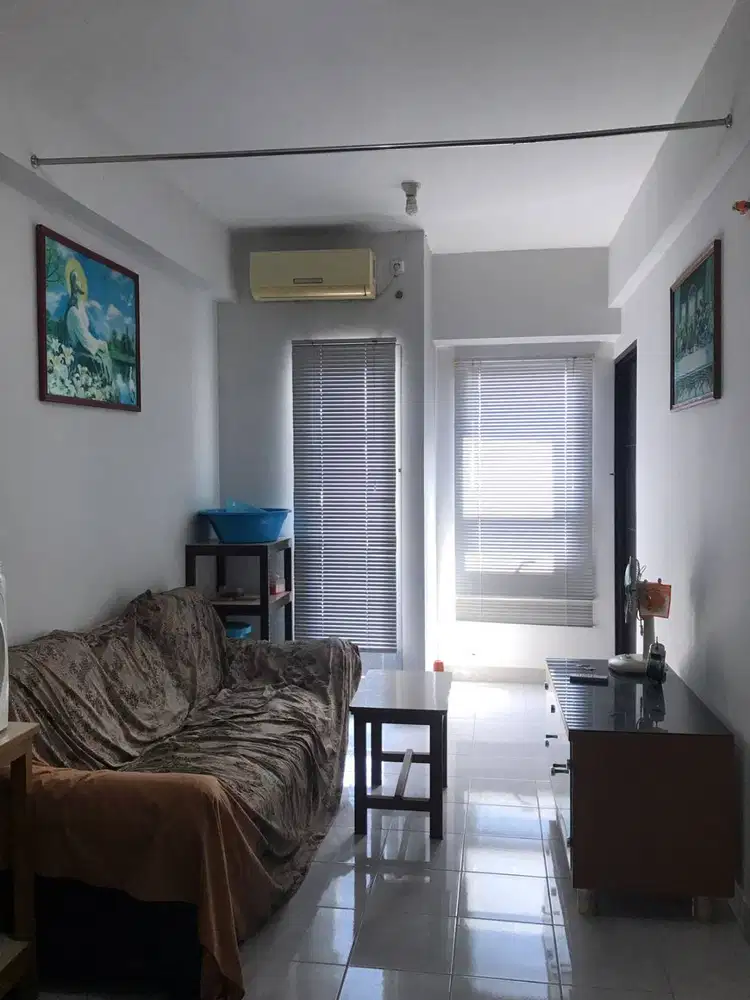 DISEWAKAN 2 BEDROOM APARTEMEN PURIMAS TIPE SEMI FURNISH ADA KOMPOR