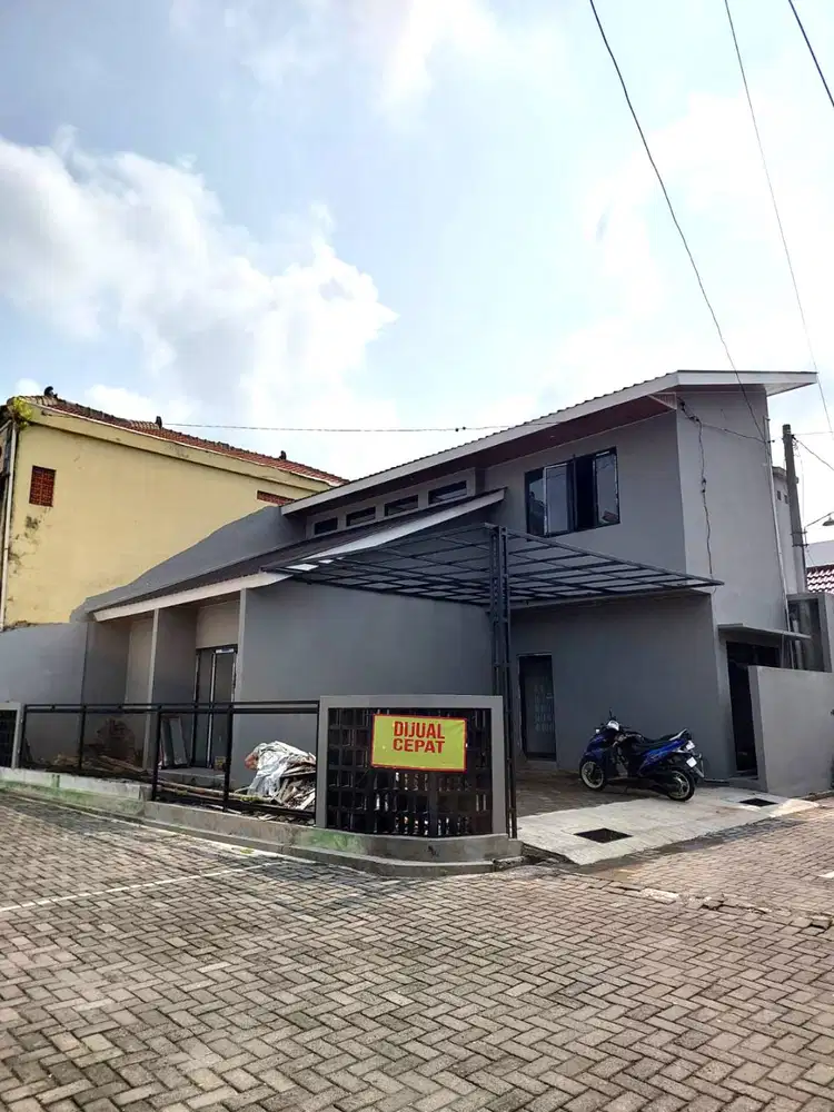 Rumah Hook Desain Industrial di Wedomartani