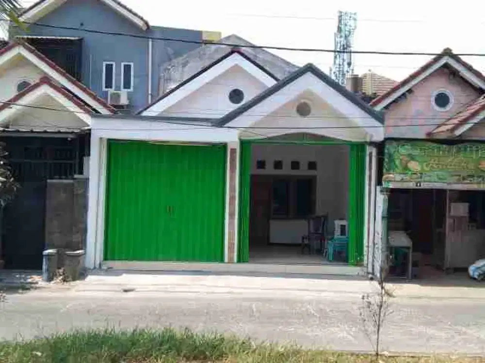 RUMAH DAN KIOS DI PINGGIR JALAN MUTIARA GADING TIMUR