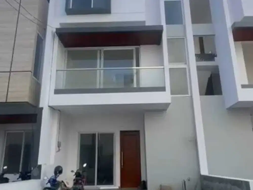 RUMAH BARU MINIMALIS 3 LANTAI HADAP TIMUR LAUT DI TAMAN SURYA 5