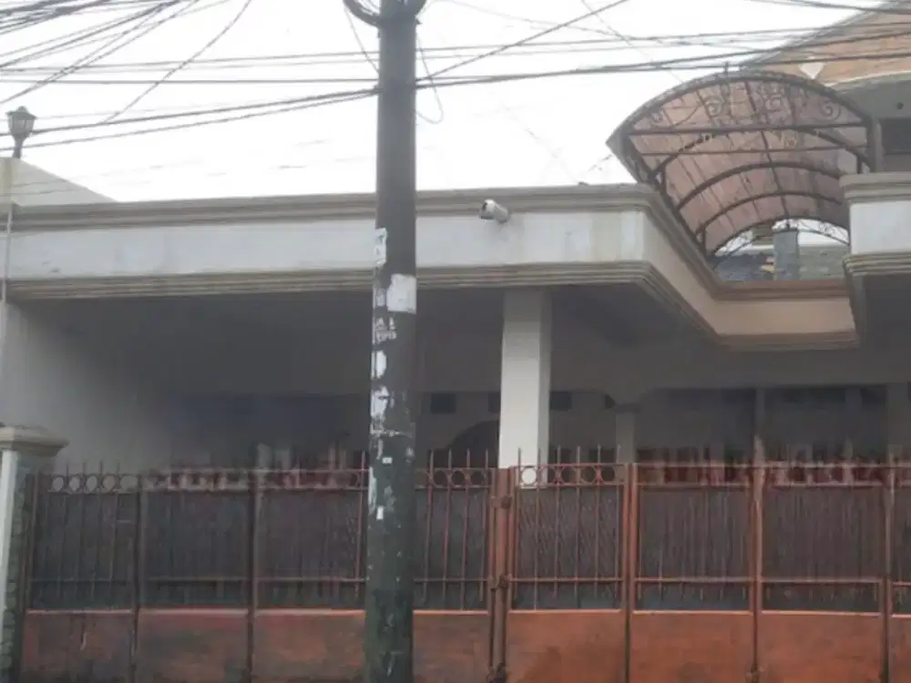 Rumah Pinggir Jalan Raya Pondok Kopi