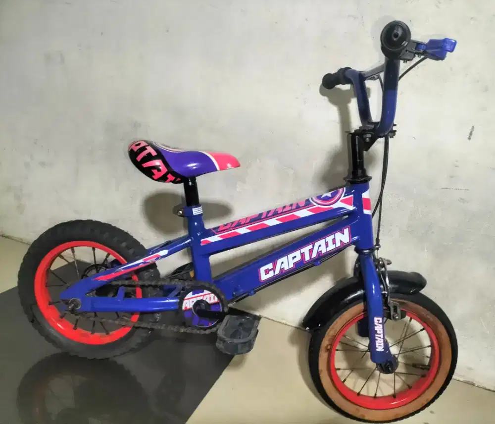 Sepeda anak ukuran 12 kondisi normal untuk anak usia 4/5 tahun