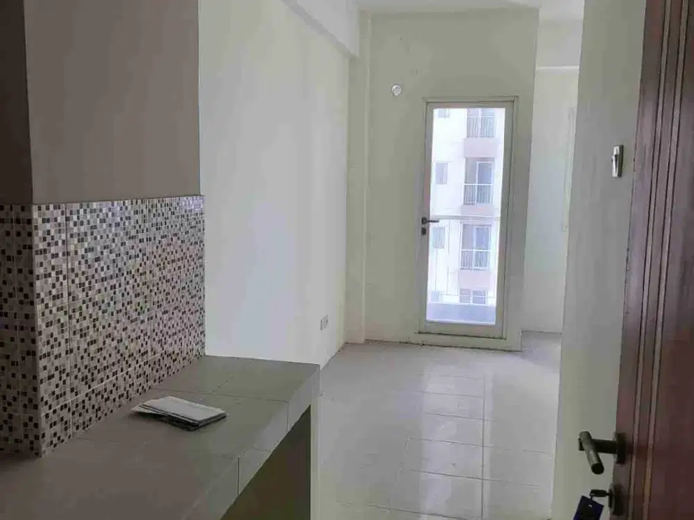 Apartemen Puncak Dharmahusada Tower B