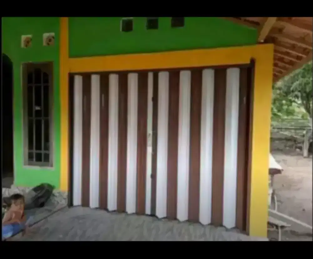 PINTU GARASI ROLLING DOOR MANUAL