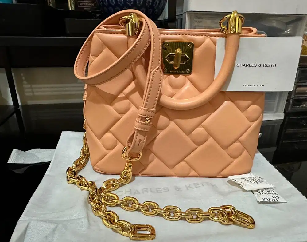 Pre loved Charles & Keith Tillie Quilted Top Handle Bag in orange