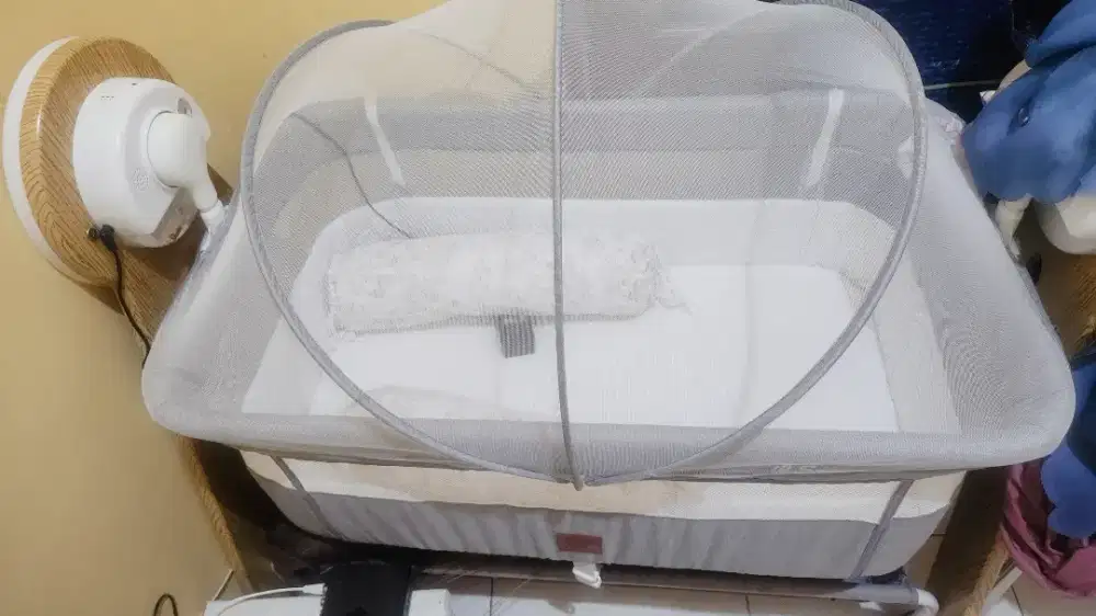 Ayunan bayi otomati (pakai baterai)