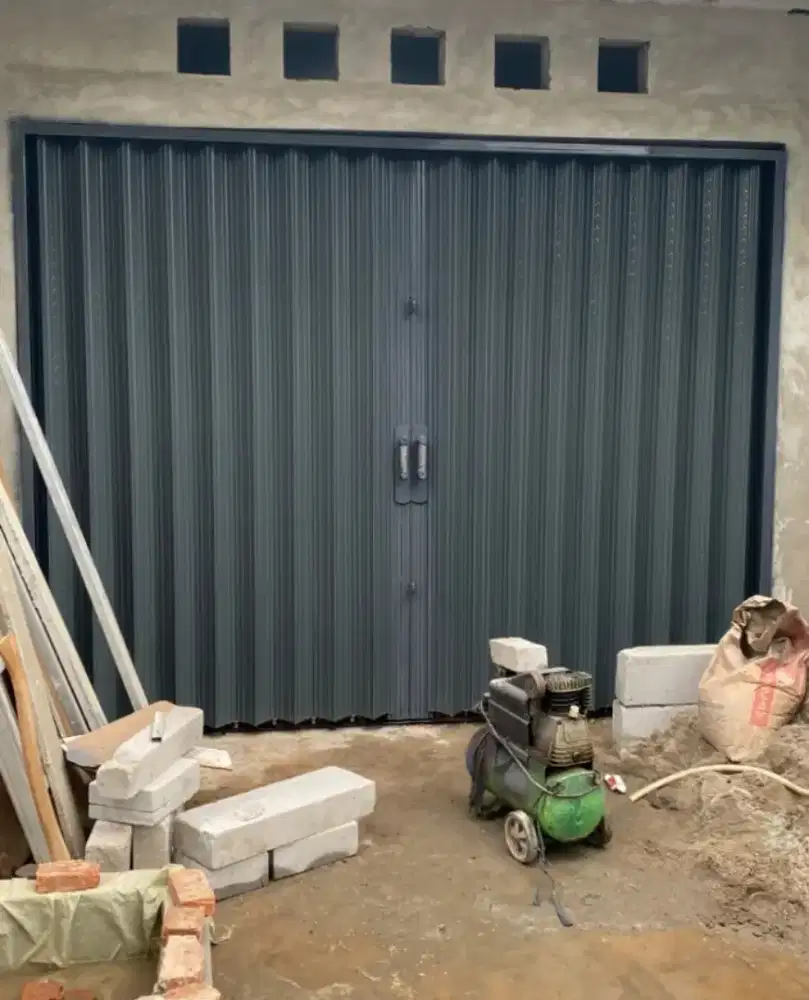 SOLUSI GARASI DAN GUDANG