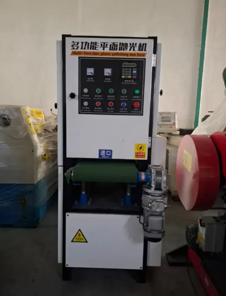 Mesin pembersih plat karat