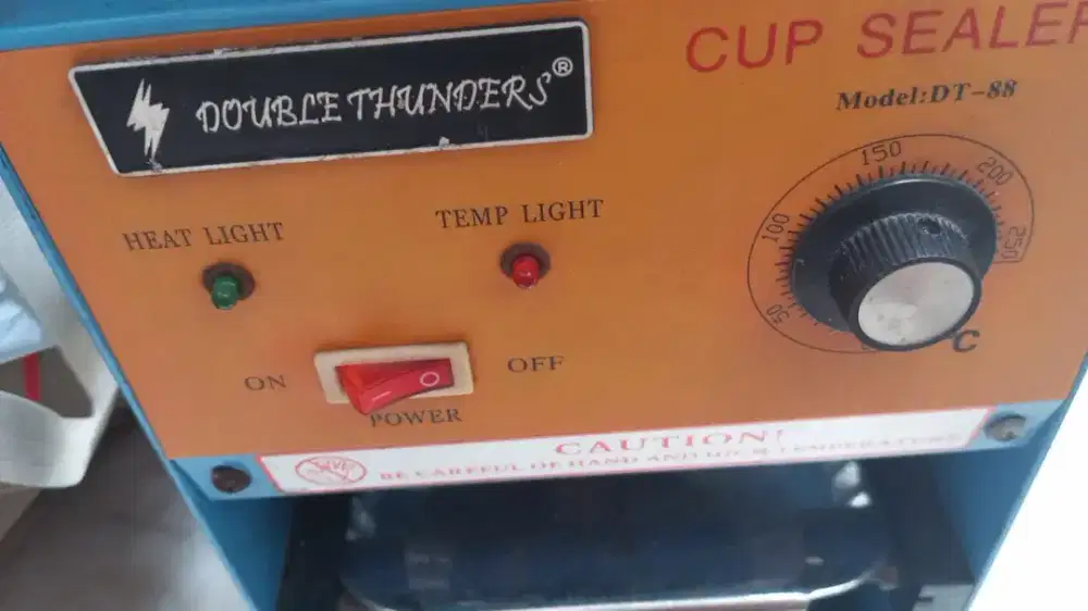 Cup Sealer Press an Cup