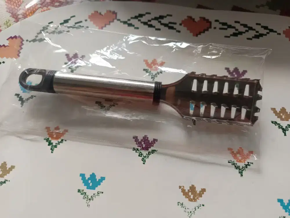 Alat menyisik kulit ikan