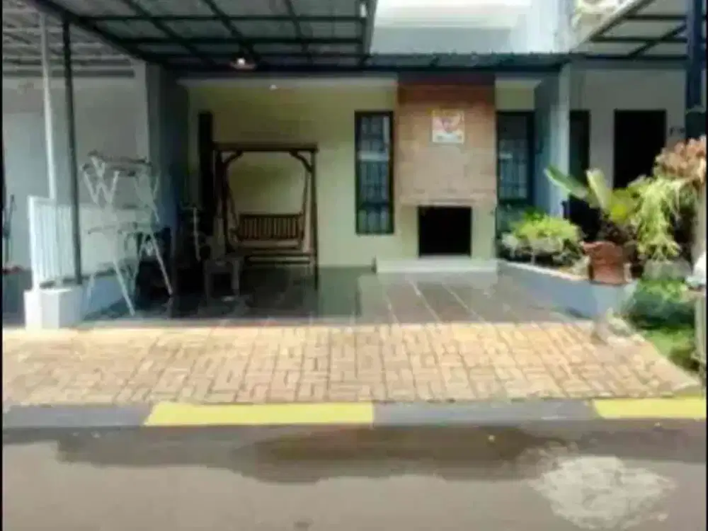 rumah modern minimalis dalam cluster di Graha Raya