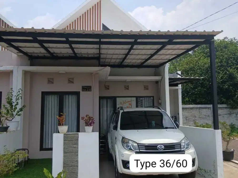 RUMAH EXCLUSIVE FASILITAS SMART HOME DAN CCTV BONUS KANOPI CANTIK
