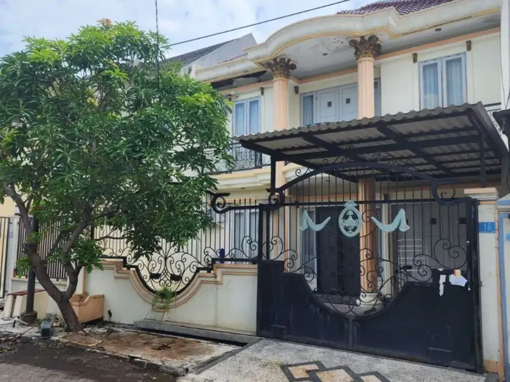 RUMAH WIGUNA TIMUR Row jalan kembar
