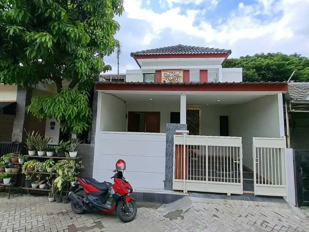 Rumah baru 1lt 800jt an Graha Indah Surabaya