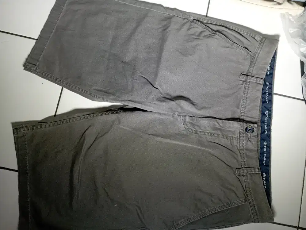 tom tailor size 34,LP: 45cm,kondisi baru,jual 100k