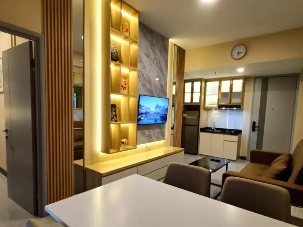 Disewakan apartemen Bella Pakuwon City full furnished baru gress