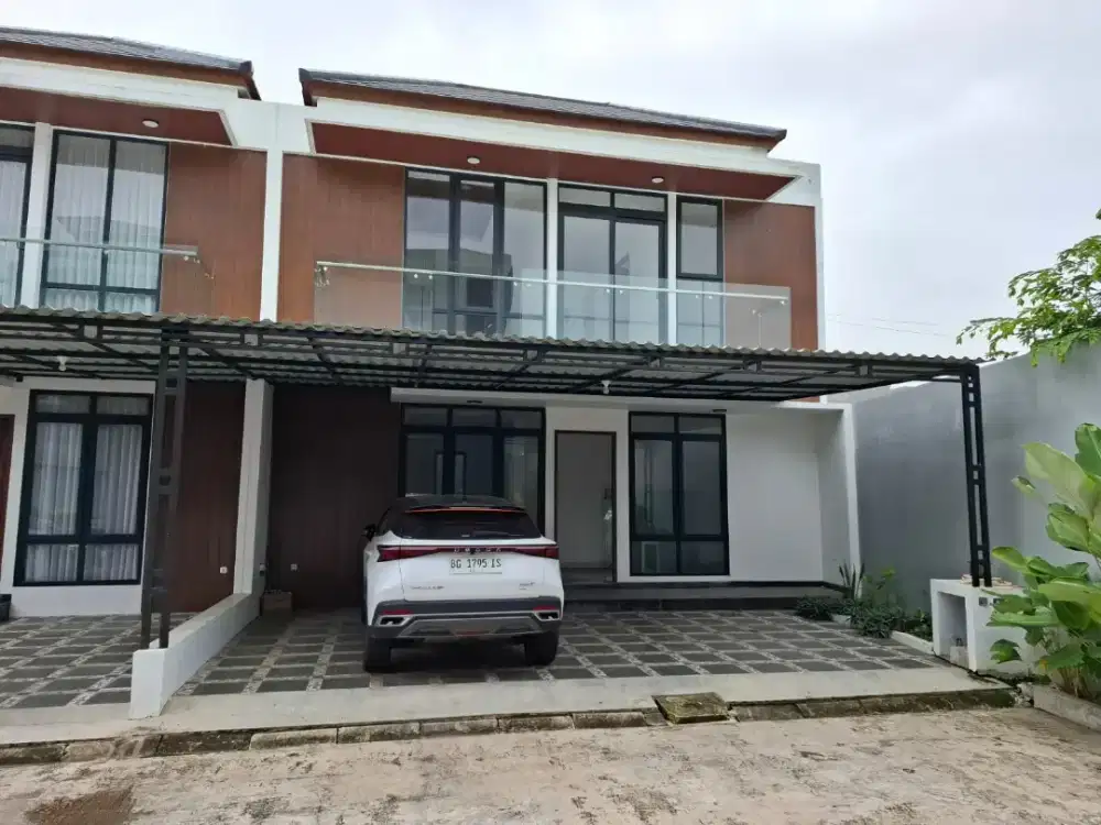 Rumah modern minimalis komplek Flower Garden