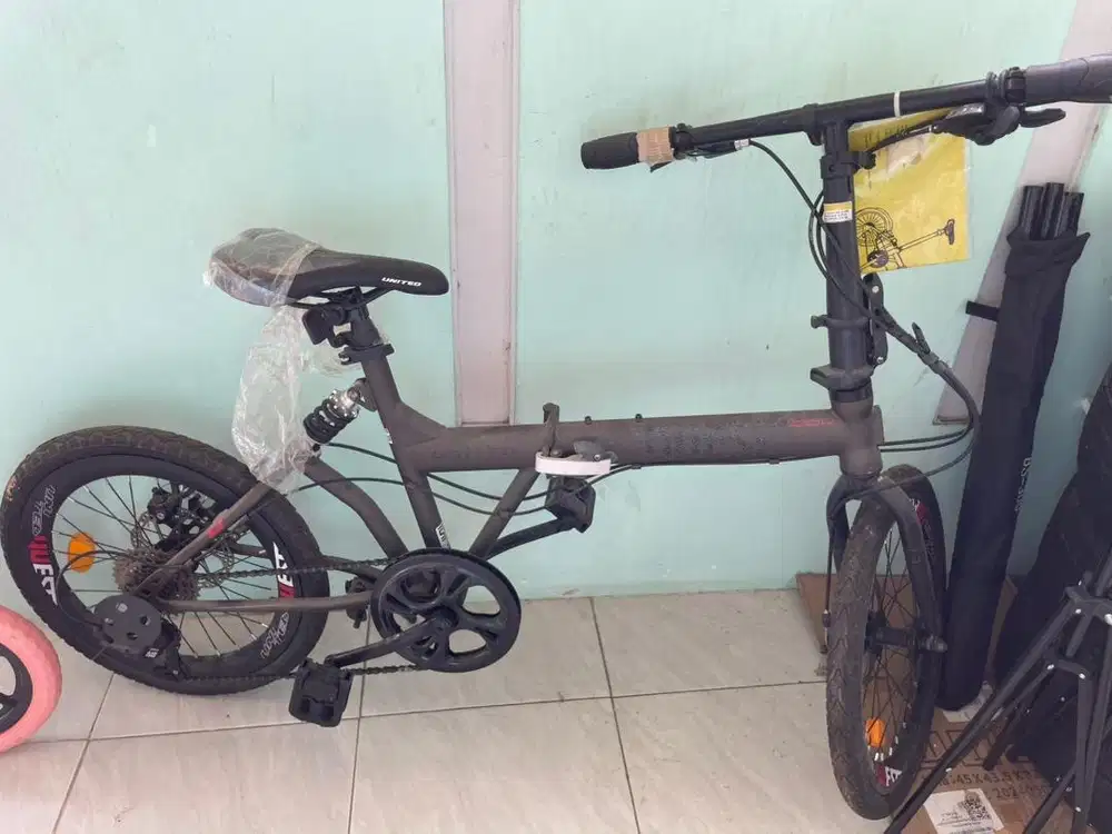 sepeda lipat jual rugi