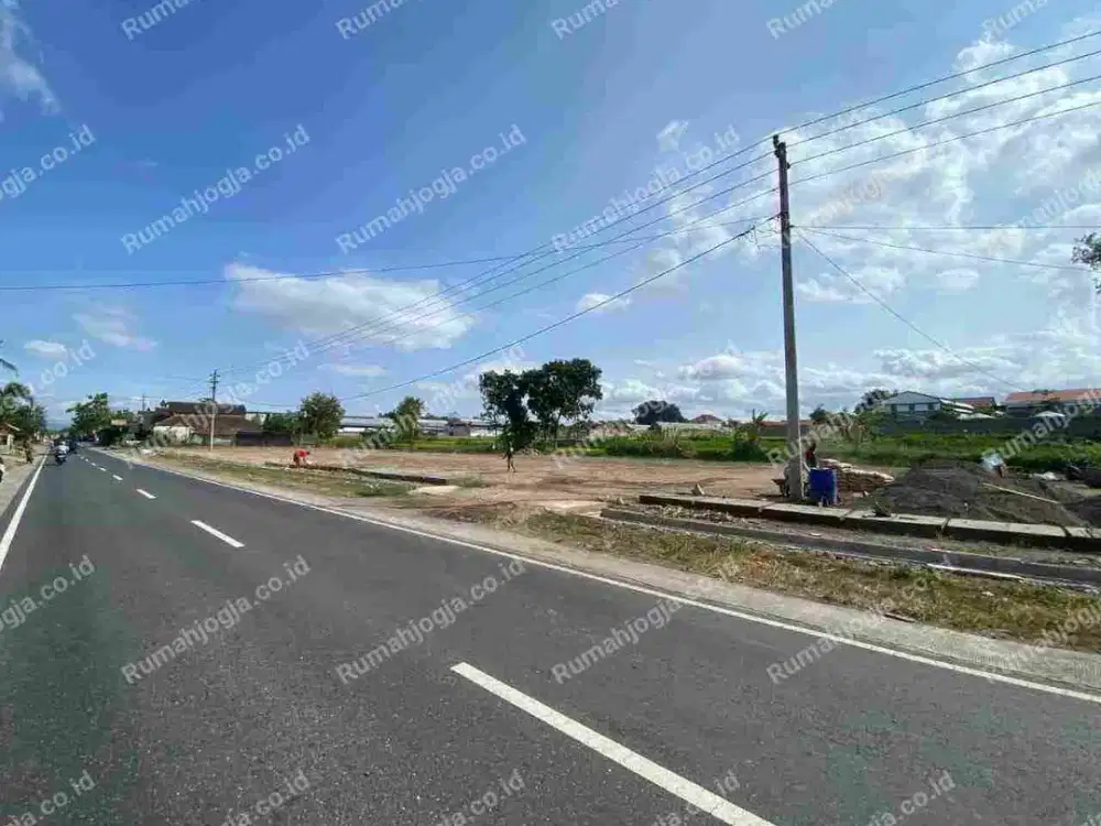 tanah luas pinggir jalan raya purwomartani cocok gudang dan perumahan