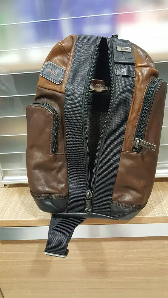 Sling bag, Tumi, leather