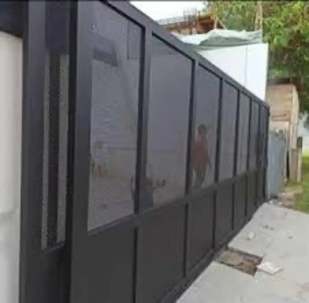 005 pagar minimalis plat bulat