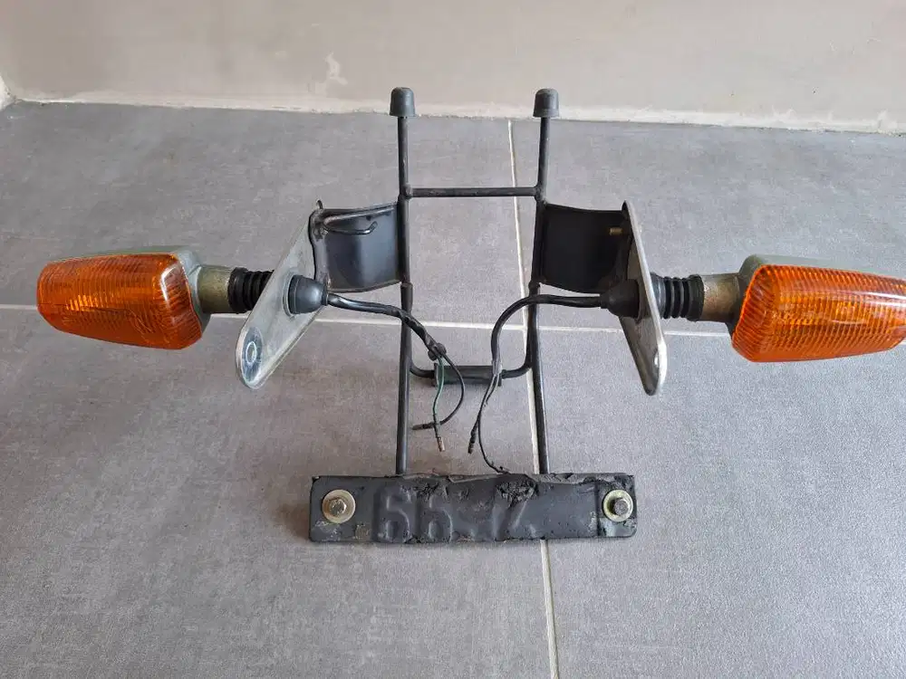 Bracket Lampu Depan Original Yamaha Scorpio