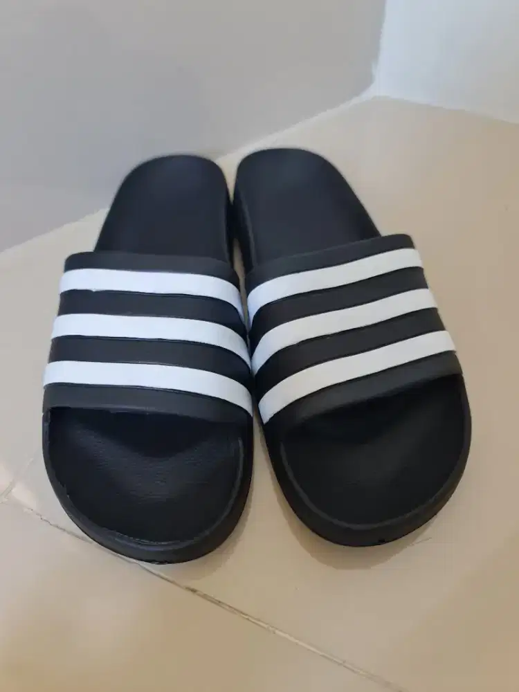 063. Sandal Pria Adidas Black White

size: 41
insole: 25.5