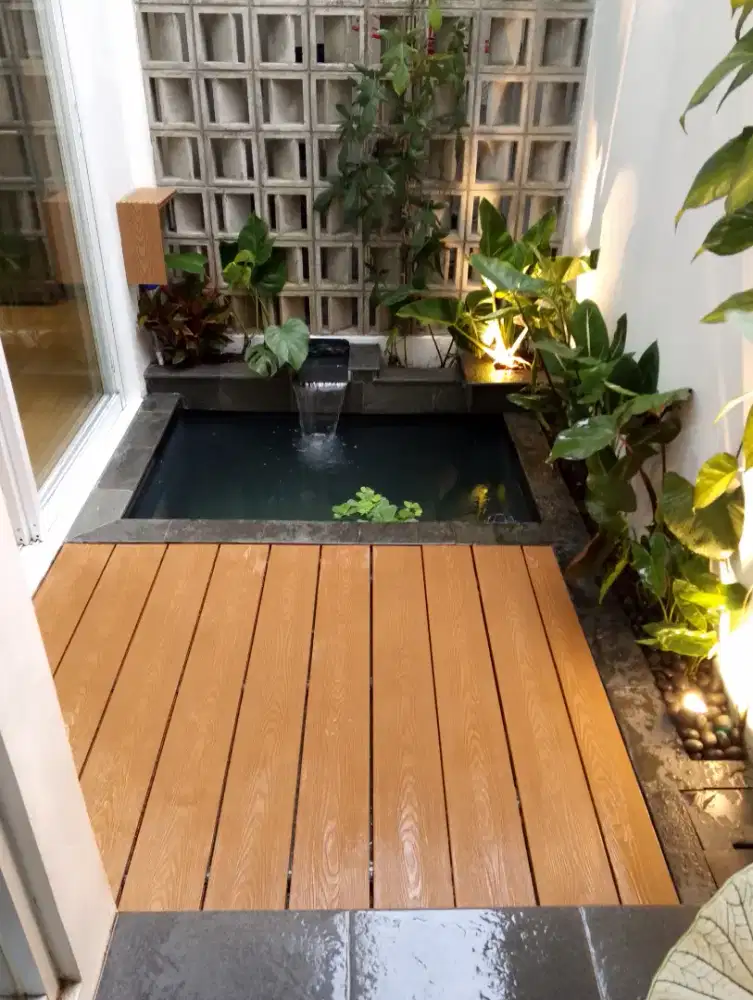 Pembuatan kolam ikan koi minimalis