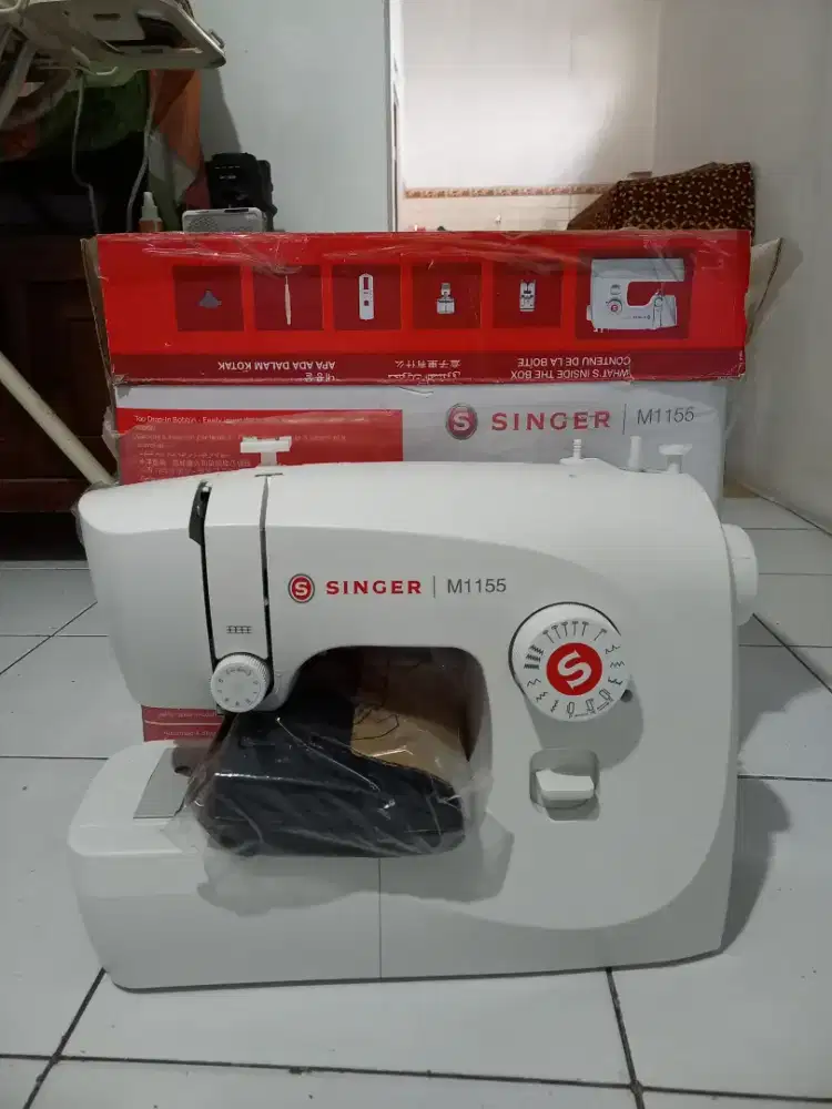 Mesin jahit portable merk singer m1154