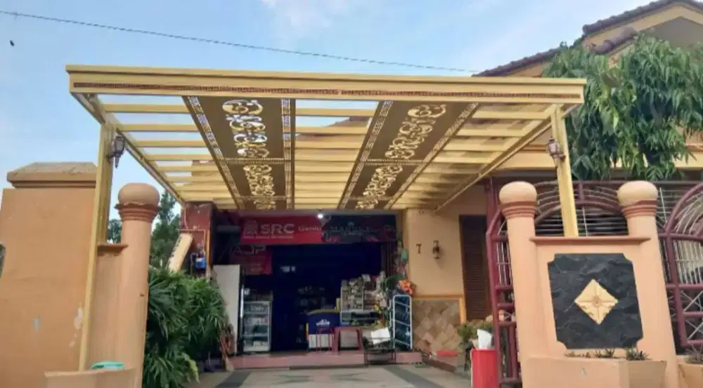 Kanopi atap kaca rangka besi