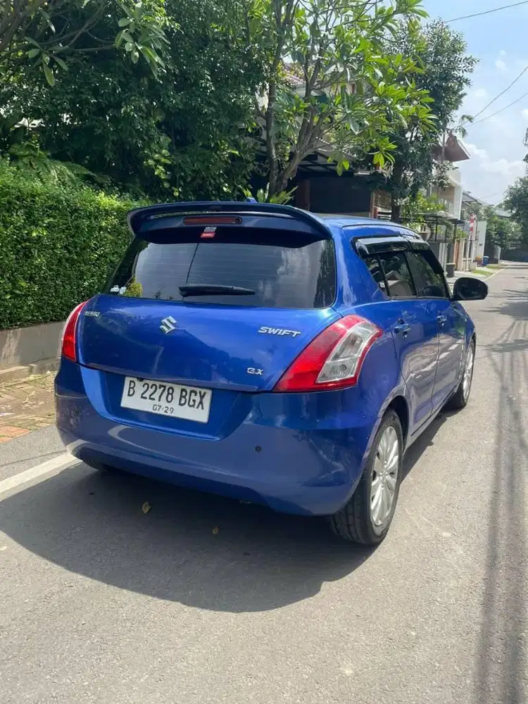 Suzuki Swift  Gx at metic th 2014 hitam nopol genap jakarta timur