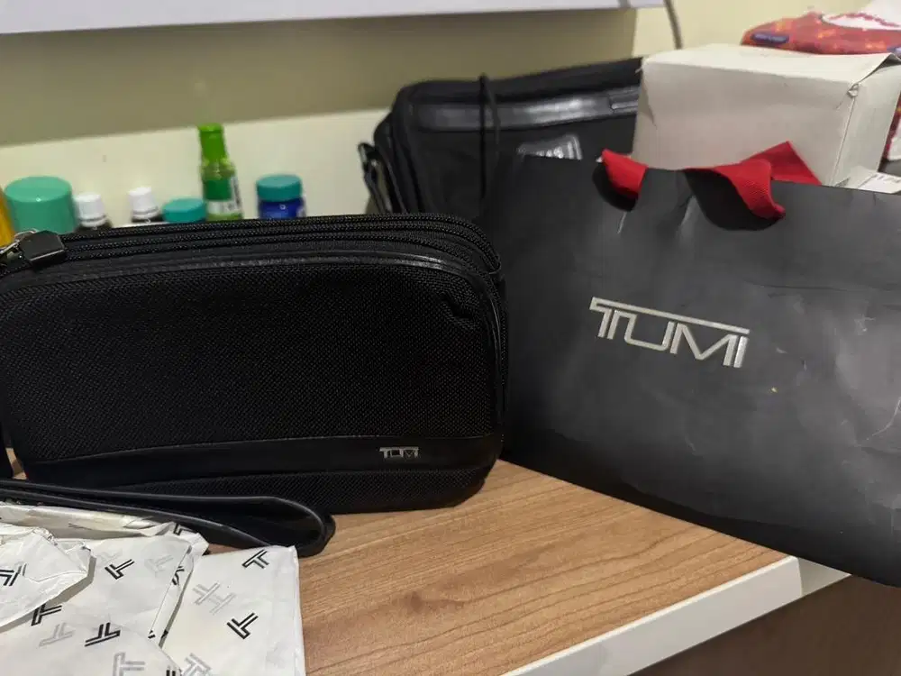 Tumi Clucth Triple Zip