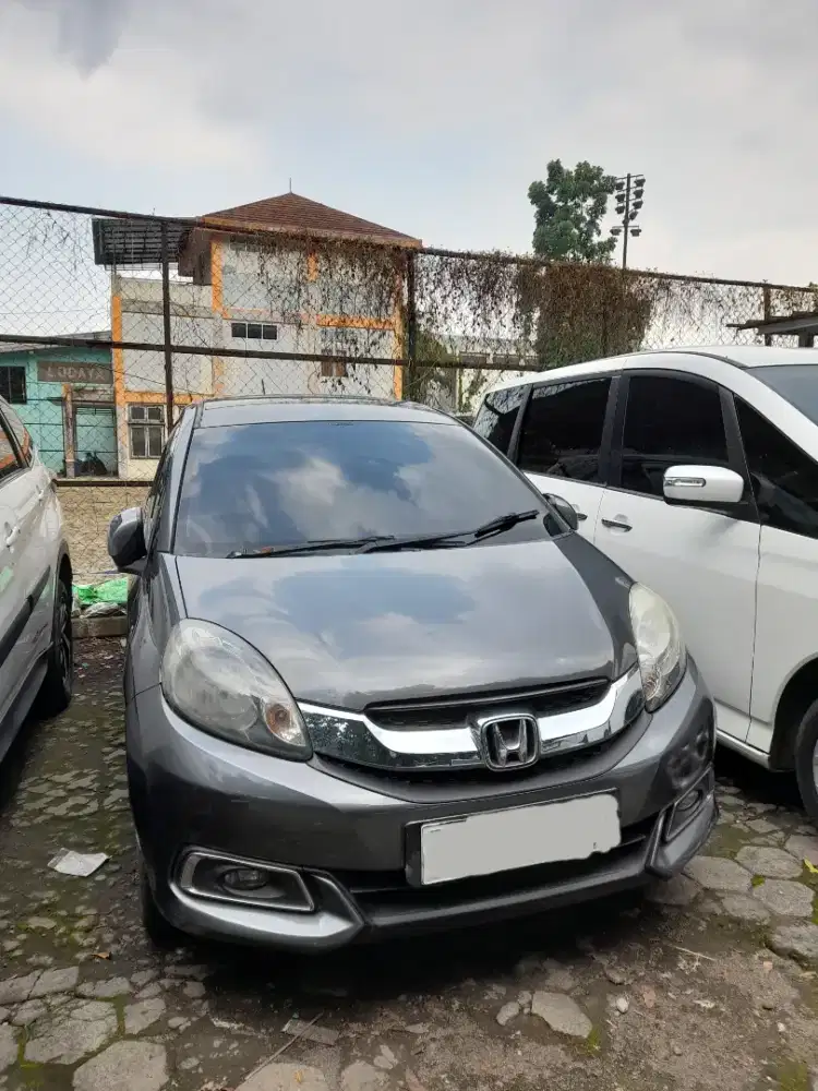 rental mobil lepas kunci atau pakai driver