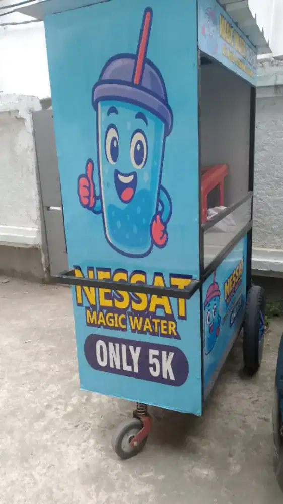 Gerobak,dandang,mesin pres, beberapa cup , komplit