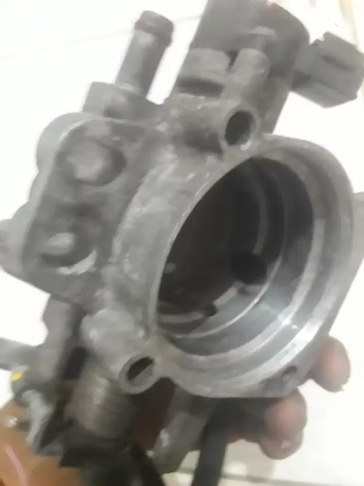 Throttle body xenia 2013