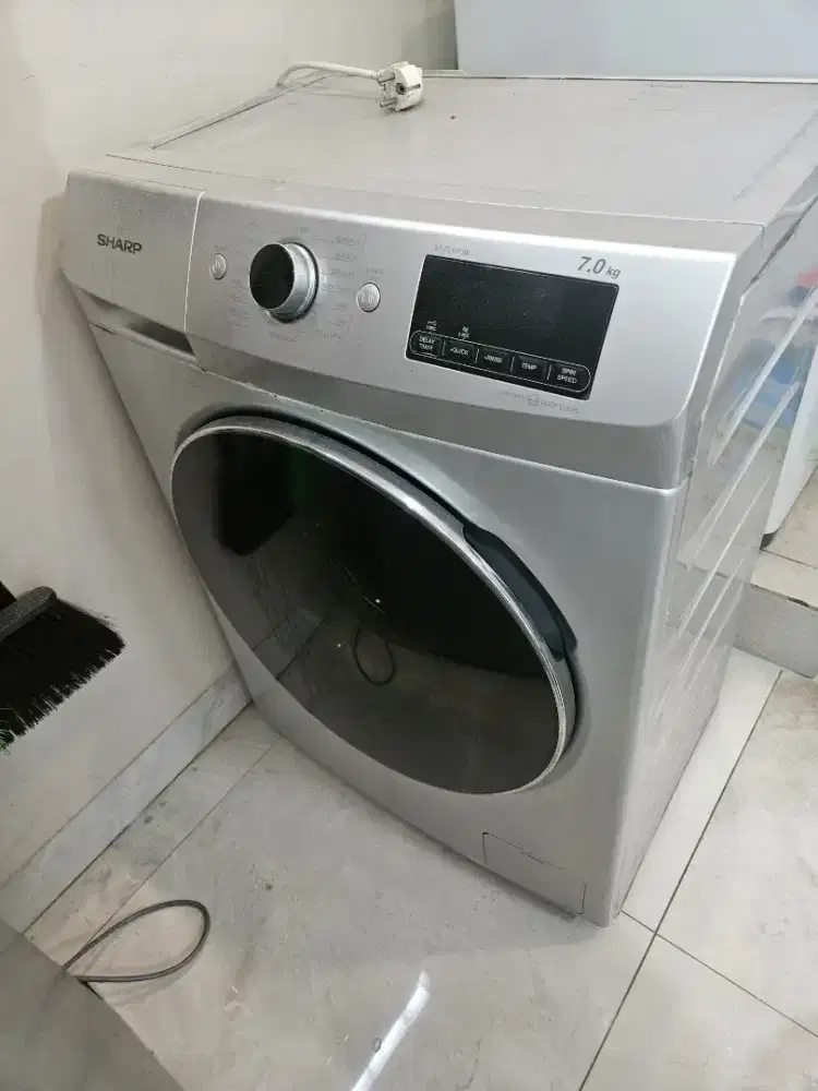 Mesin cuci front loading sharp