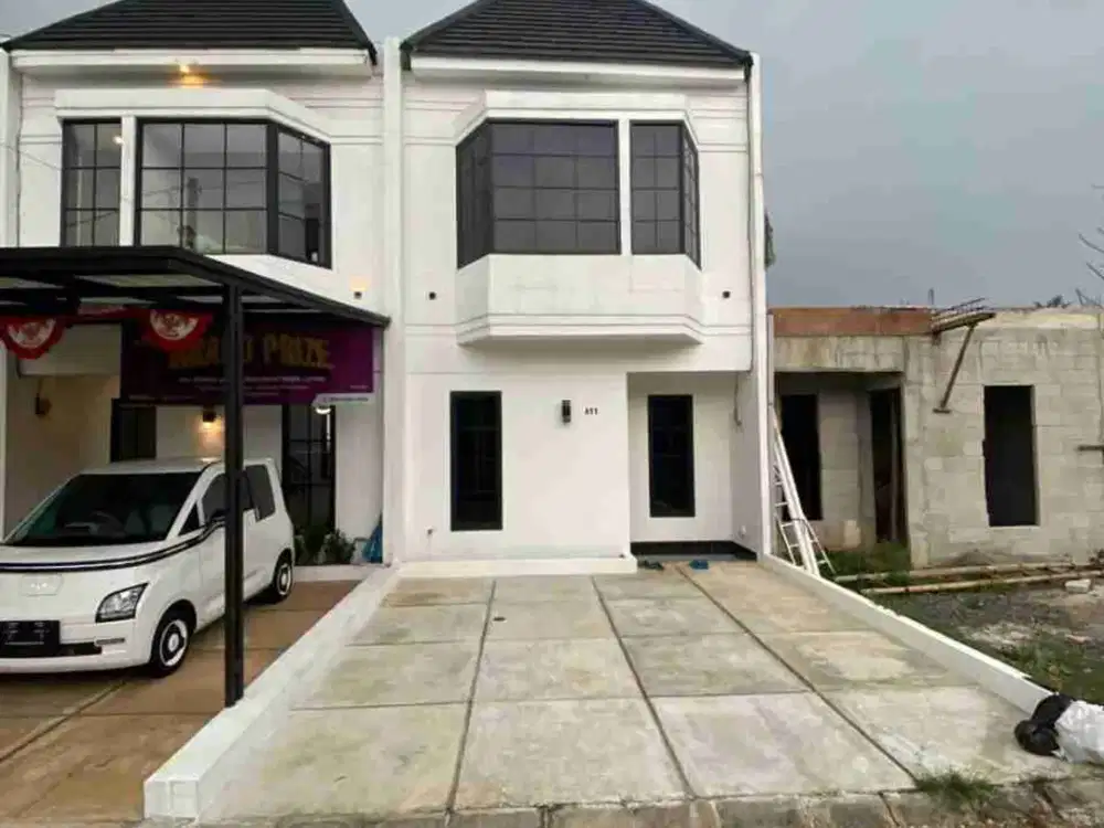 di jual rumah 2 lantai bebas banjir lokasi strategis 2 mobil
