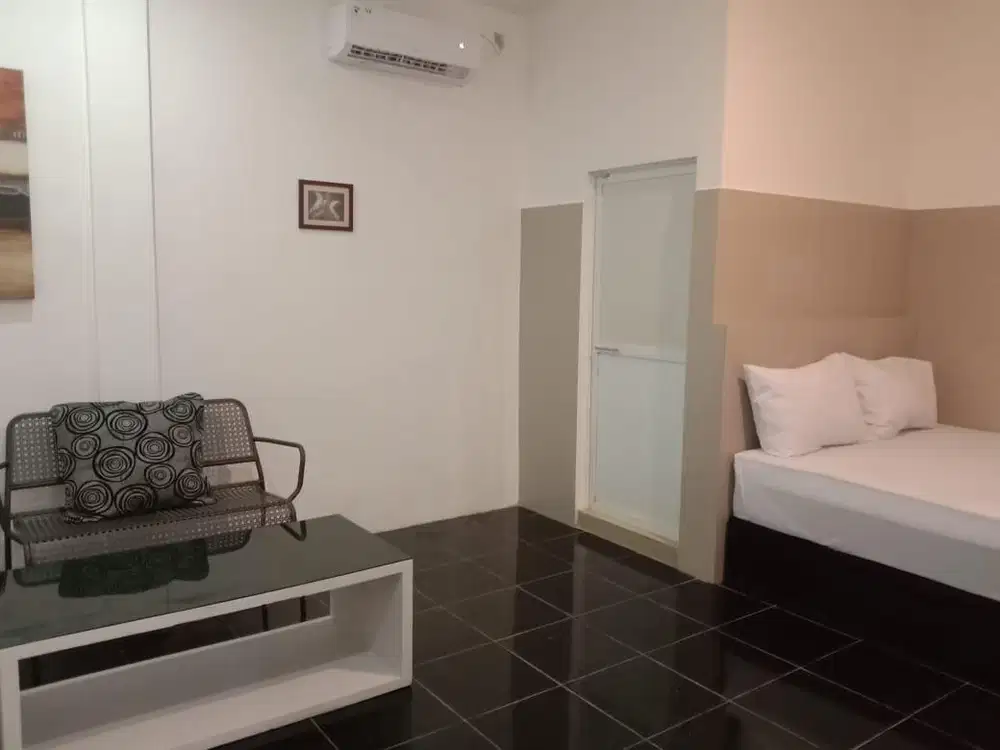 Di jual penginapan (guest house) tengah kota 4 lantai harga nego