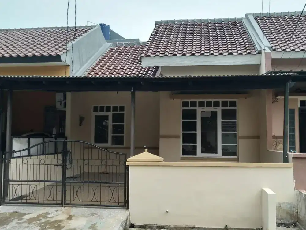 Rumah 1 1/4 lantai di REGENSI MELATI MAS 1, BSD, Serpong - siap Huni luasan 90 m²