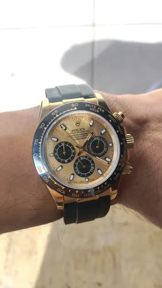 R*lex daytona black gold