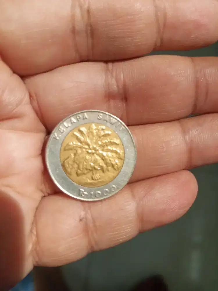 Uang kuno RP 1000 sawit