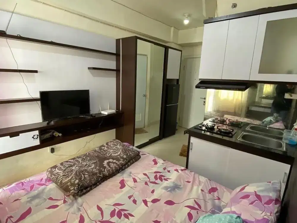 Apartment Green Pramuka City Studio Harian